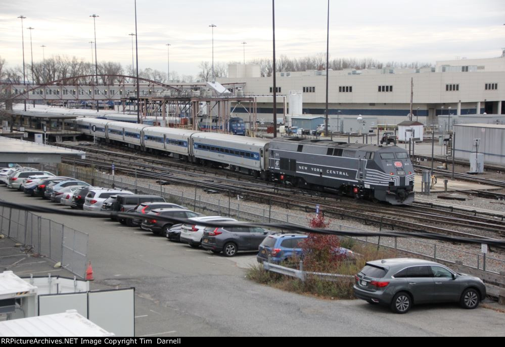 MNCR 211 pulling into the station